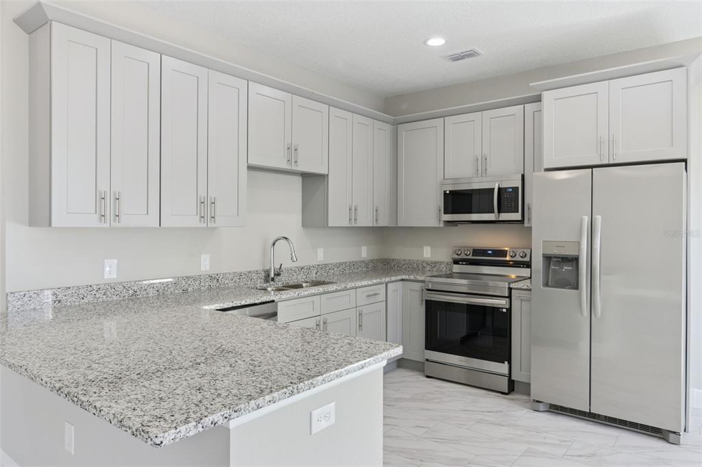 1209 Atlantic Way Kissimmee, FL 34759 - Photo 8 of 20