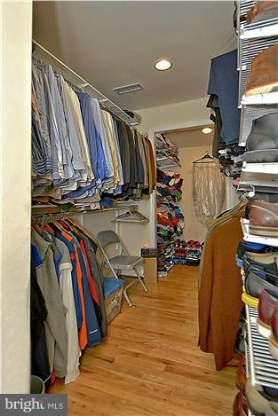 8731 Ridge Road Bethesda, MD 20817 - Photo 16 of 29 a view of walk in closet with clothes