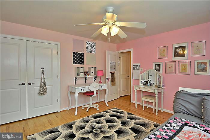 8731 Ridge Road Bethesda, MD 20817 - Photo 18 of 29 a room with furniture a rug and a window