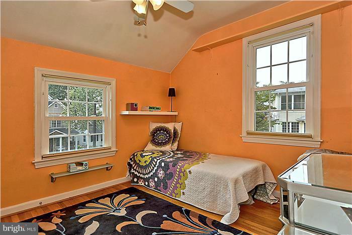 8731 Ridge Road Bethesda, MD 20817 - Photo 21 of 29 a bed room with a bed and a window