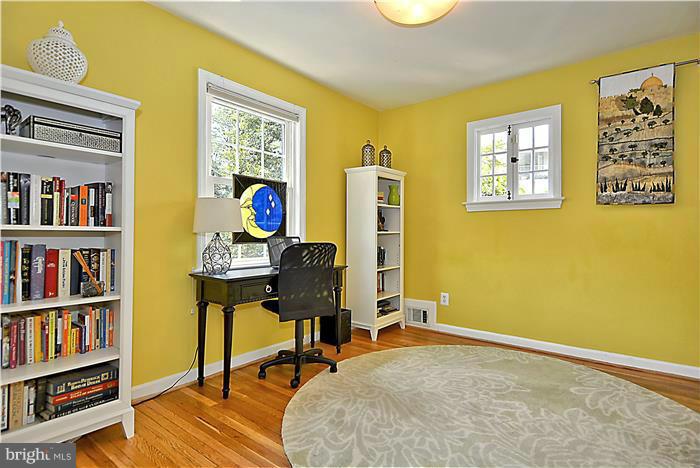 8731 Ridge Road Bethesda, MD 20817 - Photo 26 of 29 a workspace with furniture and bookshelf