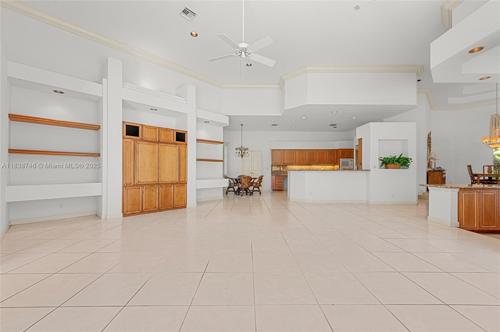 3833 Pine Lake Drive Weston, FL 33332 - Photo 19 of 46 a view of a kitchen with furniture and faucet