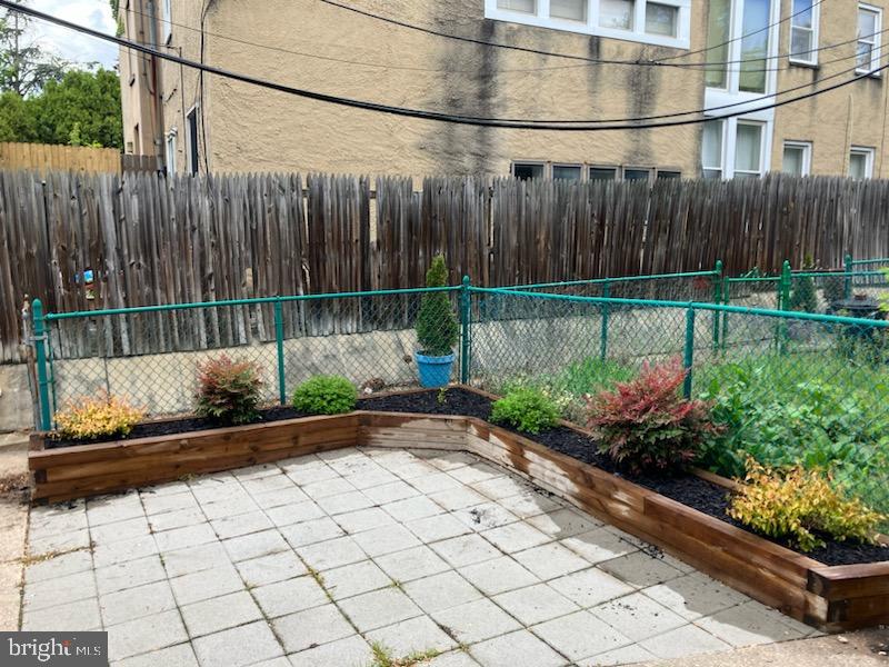1522 East Baltimore Street, Unit 1 Baltimore, MD 21231 - Photo 23 of 26 a view of a backyard with sitting area