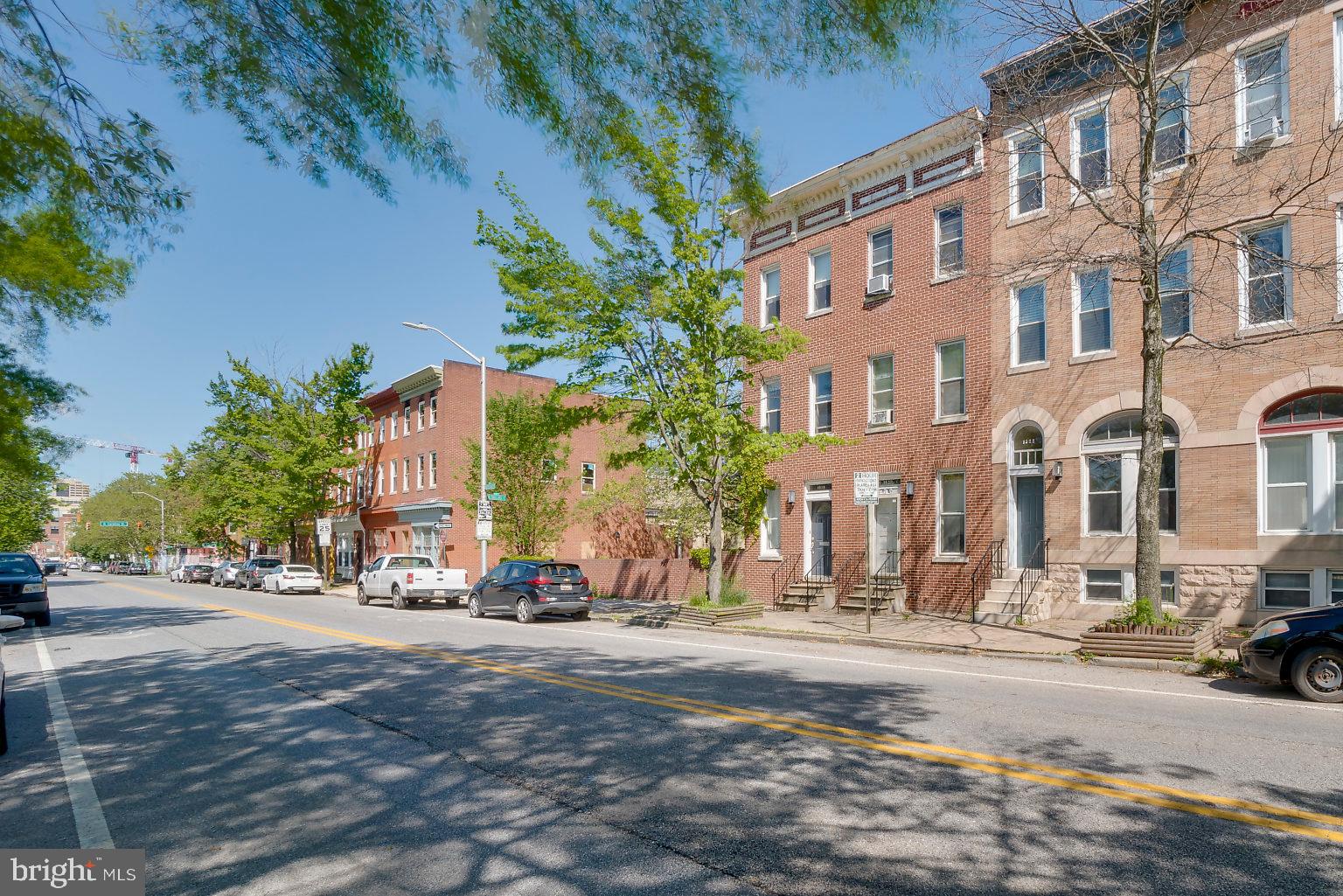 1522 East Baltimore Street, Unit 1 Baltimore, MD 21231 - Photo 5 of 26 a view of a street with a building in the background