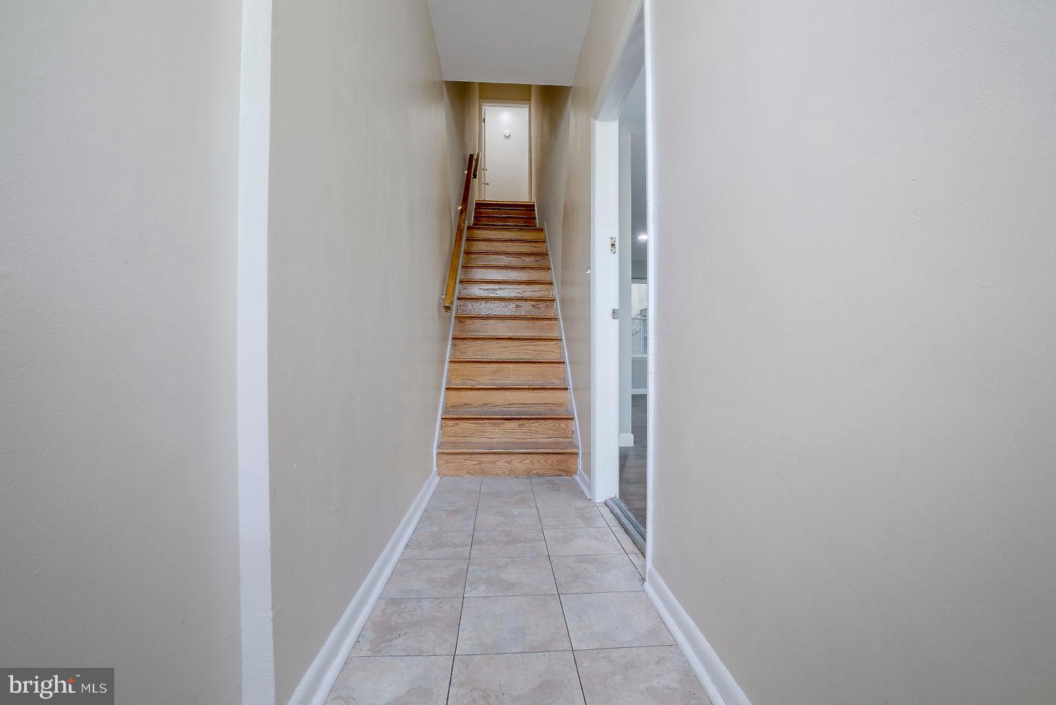 1522 East Baltimore Street, Unit 1 Baltimore, MD 21231 - Photo 6 of 26 a view of a hallway with stairs