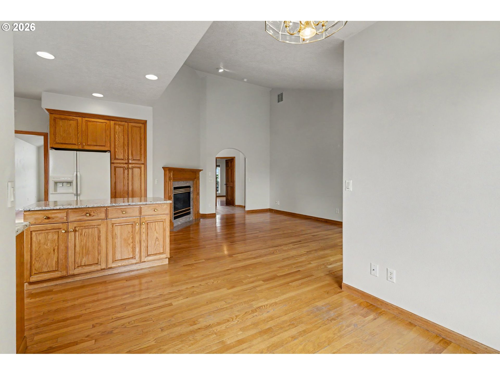 1470 Ranier Loop Northwest Salem, OR 97304 - Photo 20 of 48 a view of empty room with wooden floor and fan