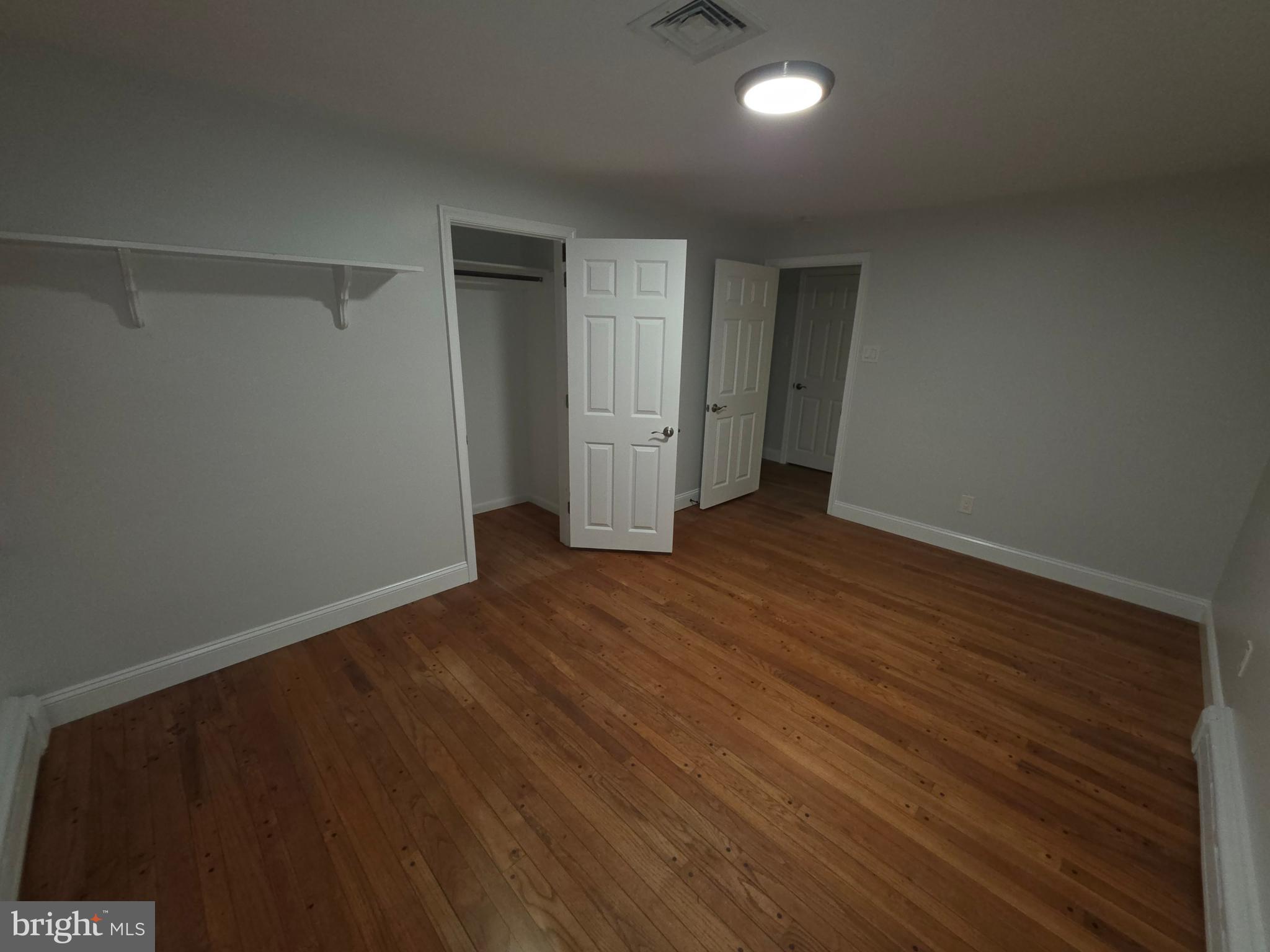 139 Mattson Road Garnet Valley, PA 19060 - Photo 44 of 61 a view of an empty room with wooden floor and closet