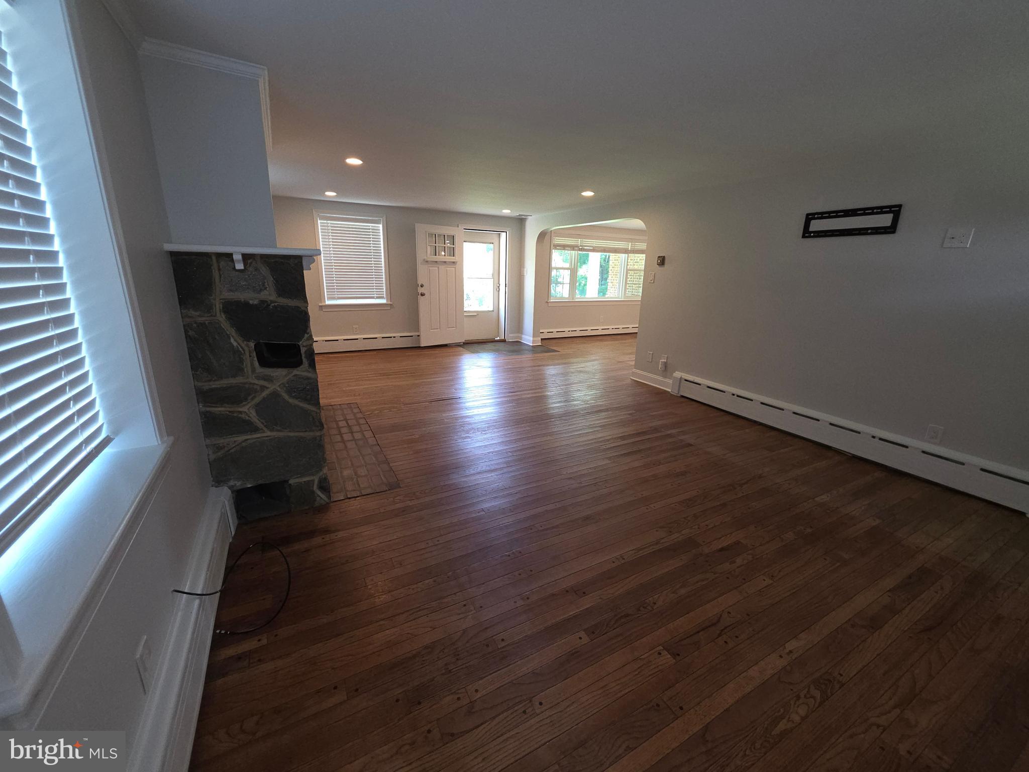 139 Mattson Road Garnet Valley, PA 19060 - Photo 45 of 61 an empty room with wooden floor and windows