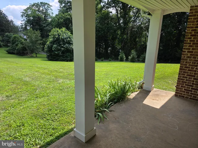 a view of a garden with an empty space