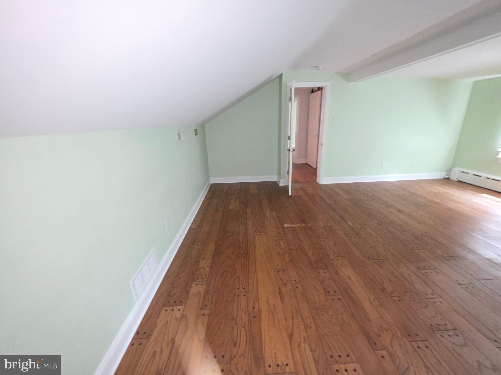 139 Mattson Road Garnet Valley, PA 19060 - Photo 56 of 61 a view of hallway with wooden floor