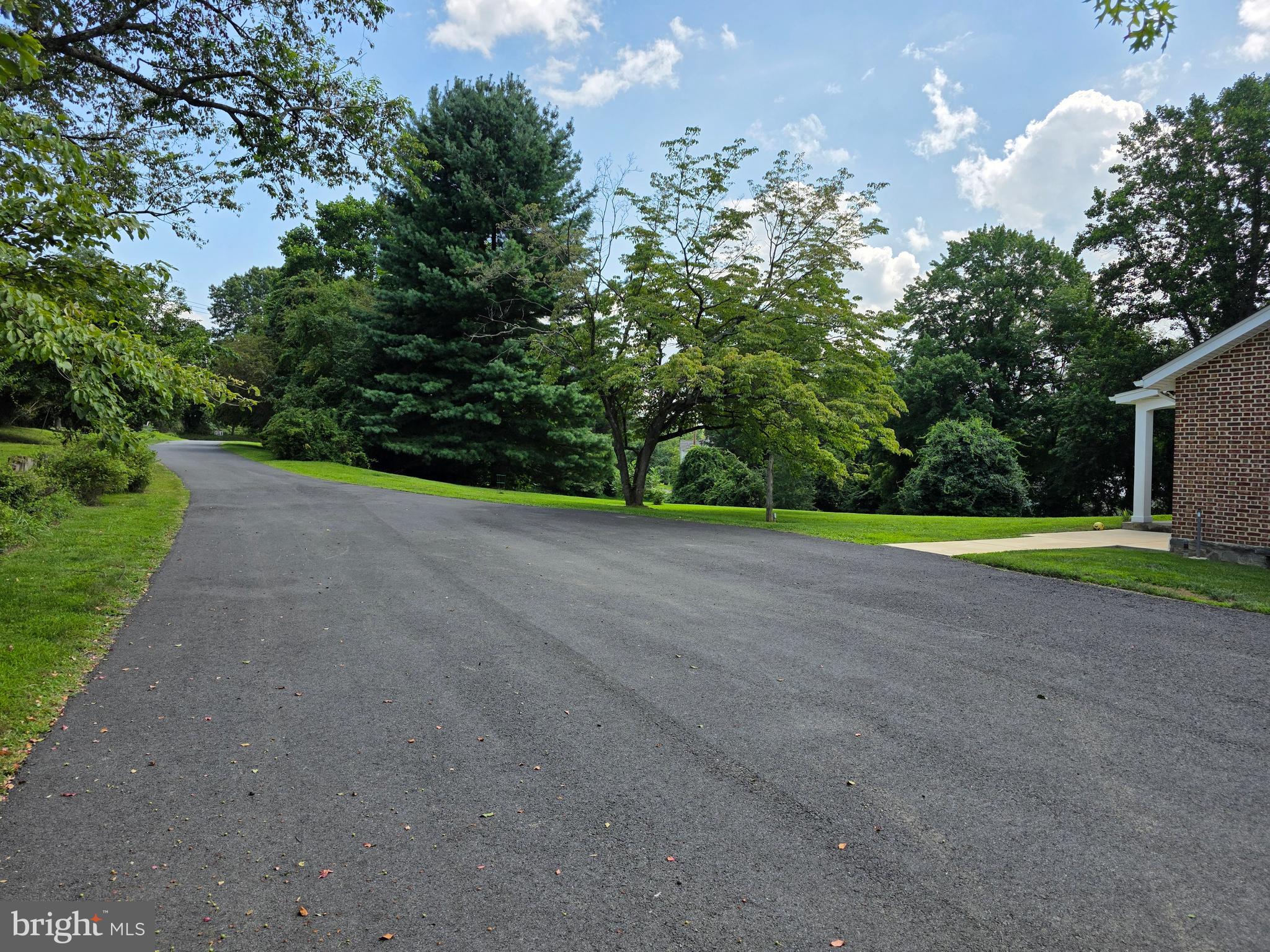 139 Mattson Road Garnet Valley, PA 19060 - Photo 8 of 61 a view of a garden with a bench