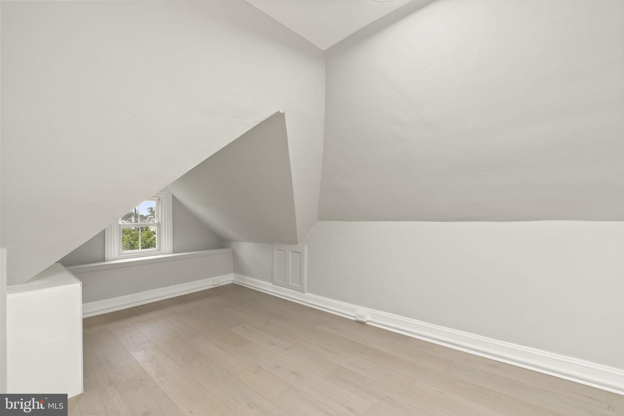 216 Collingdale Avenue, Unit 5 Collingdale, PA 19023 - Photo 10 of 12 a view of an empty room with windows