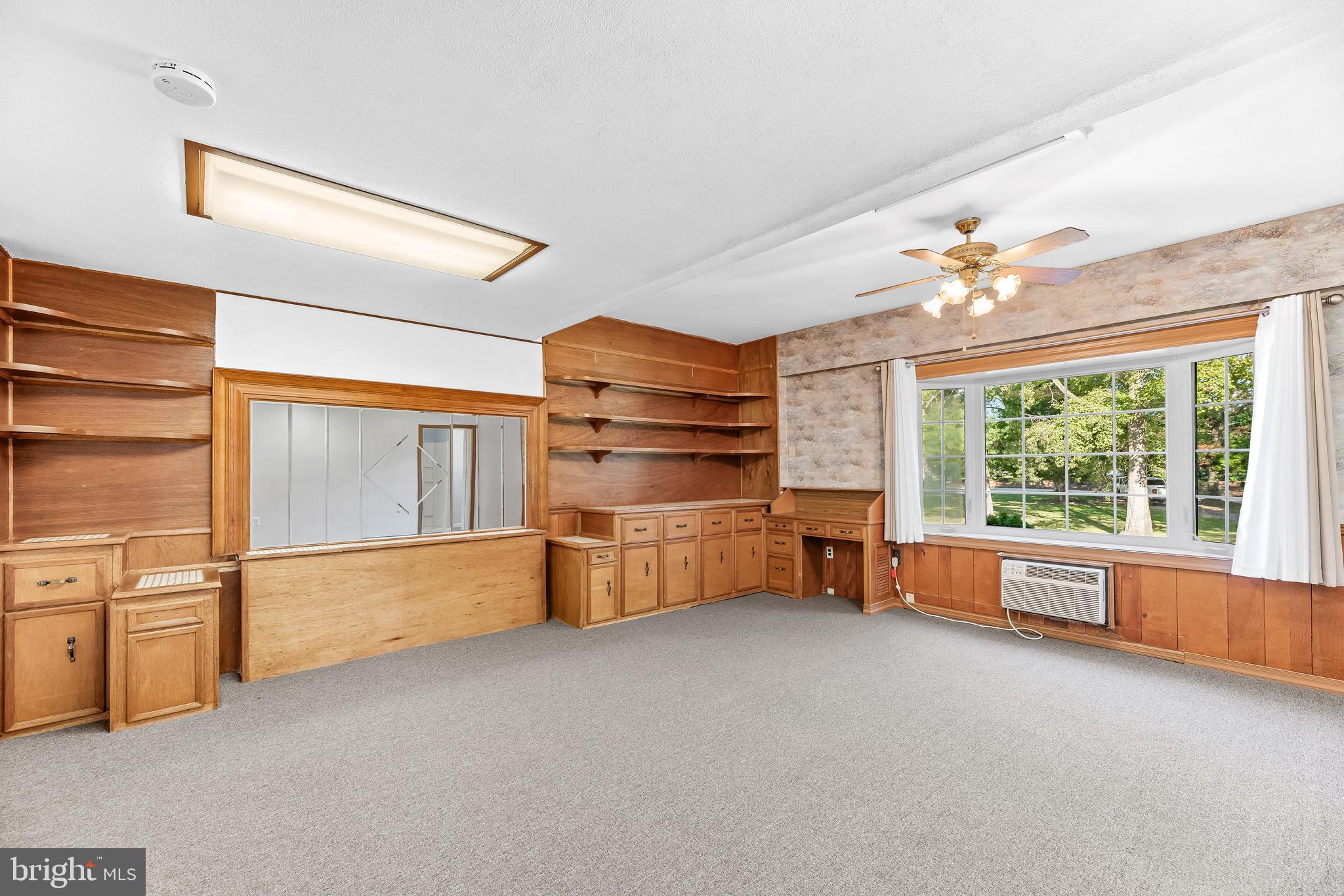 1730 Holland Cliffs Road Huntingtown, MD 20639 - Photo 24 of 46 2nd Primary Bedroom-Converted Garage w. Built-Ins