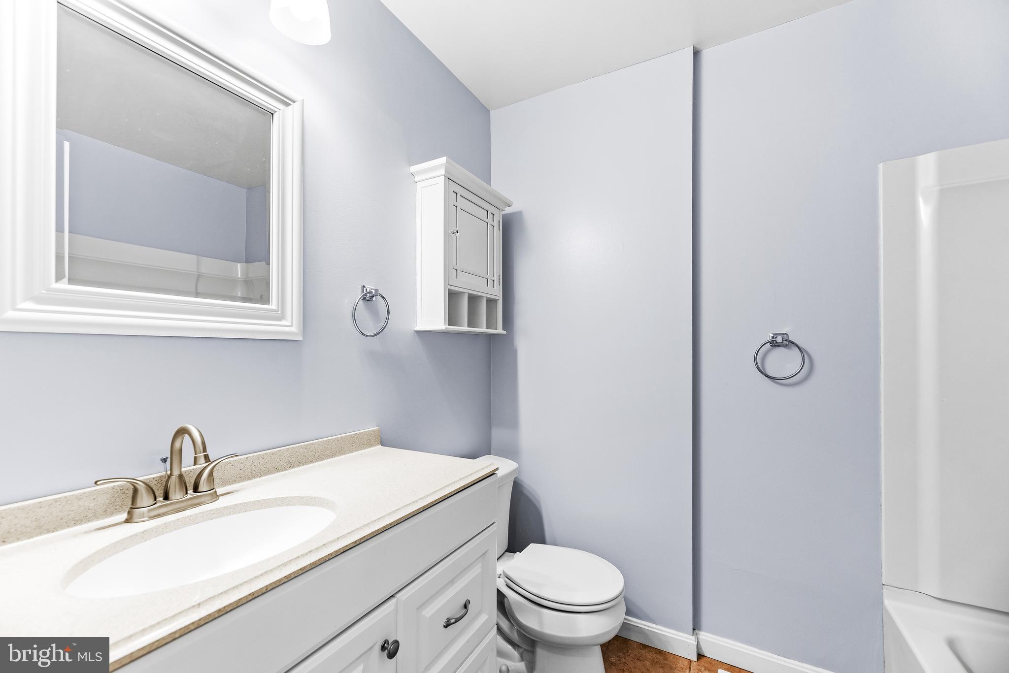 1730 Holland Cliffs Road Huntingtown, MD 20639 - Photo 31 of 46 Updated Hall Bathroom