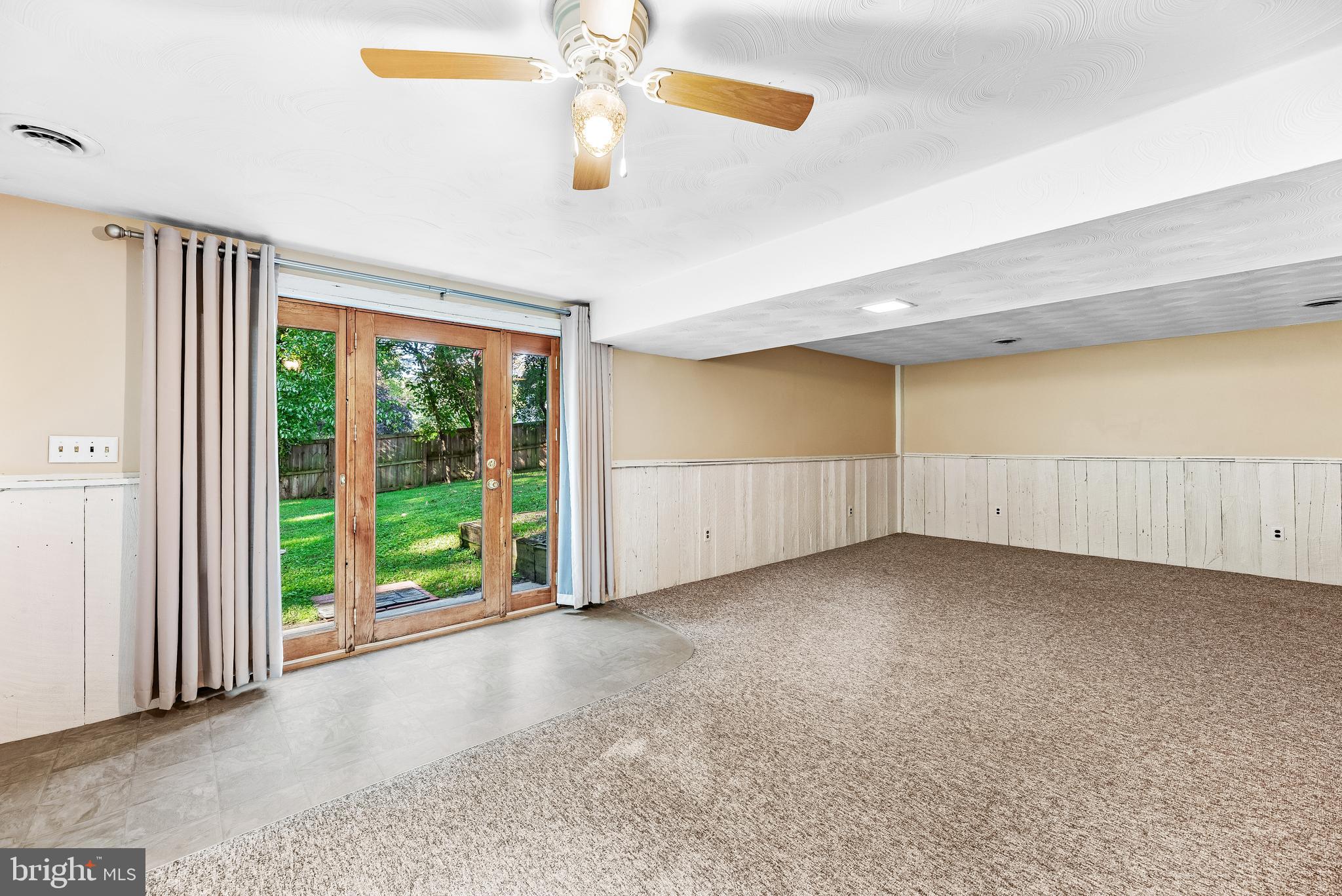 1730 Holland Cliffs Road Huntingtown, MD 20639 - Photo 38 of 46 Rec Room with French Doors to back yard