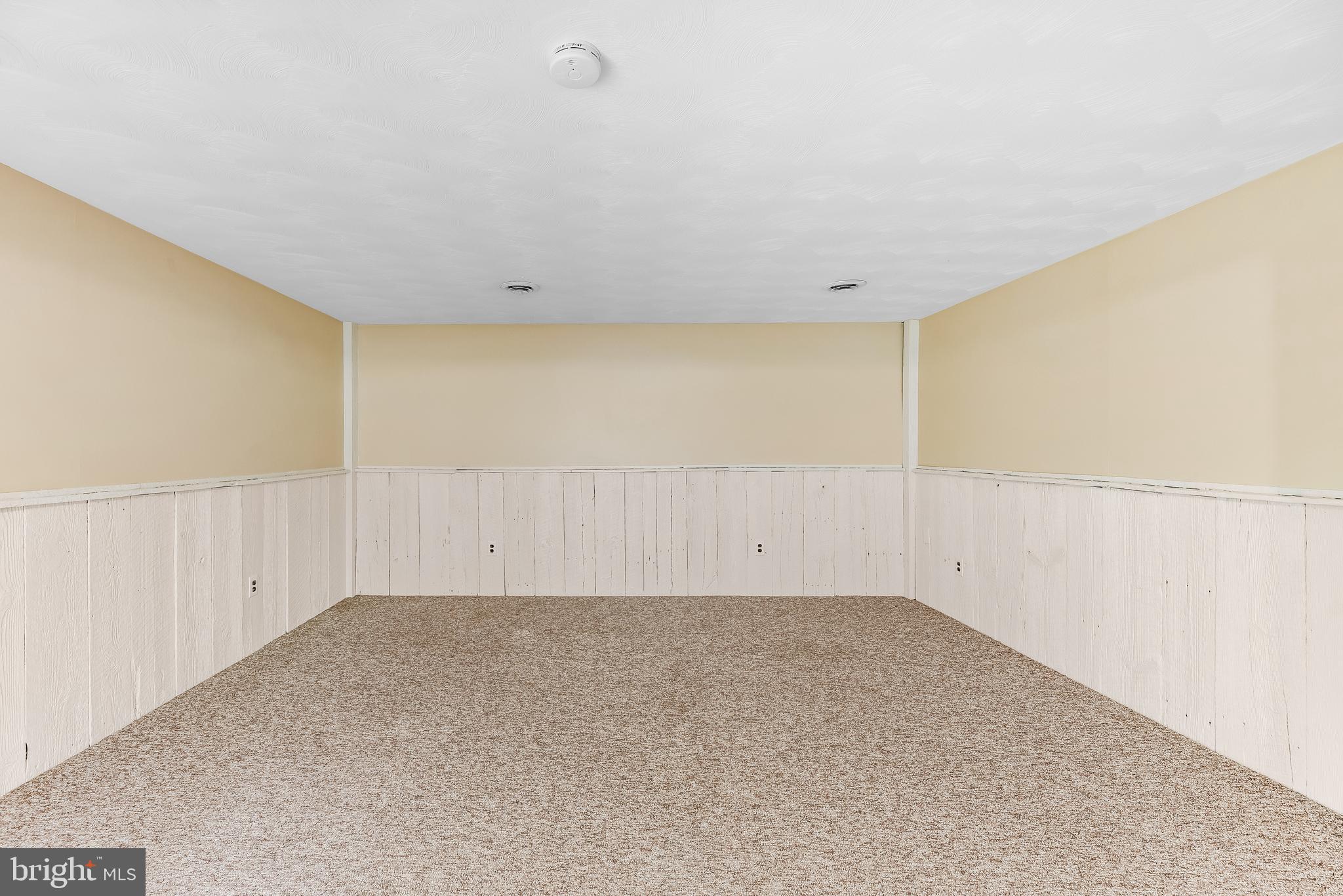 1730 Holland Cliffs Road Huntingtown, MD 20639 - Photo 40 of 46 Wood Paneling giving a beach feel to this space