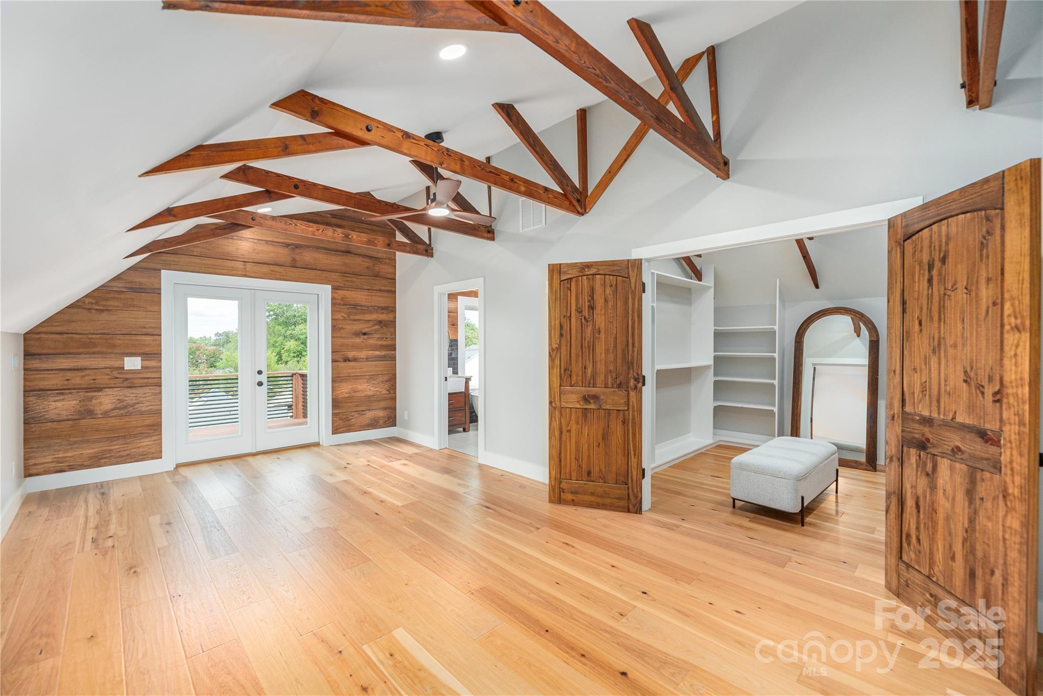 234 Erwin Hills Road Asheville, NC 28806 - Photo 21 of 47 a bedroom with a bed and a large window