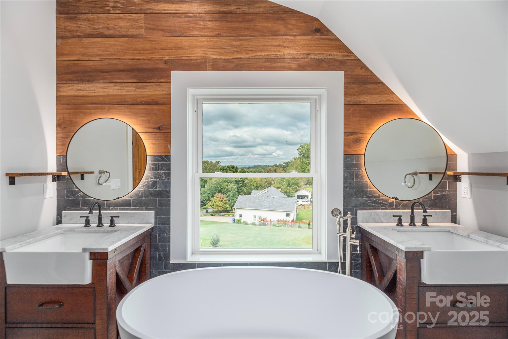 234 Erwin Hills Road Asheville, NC 28806 - Photo 25 of 47 a bathroom with a sink and a mirror