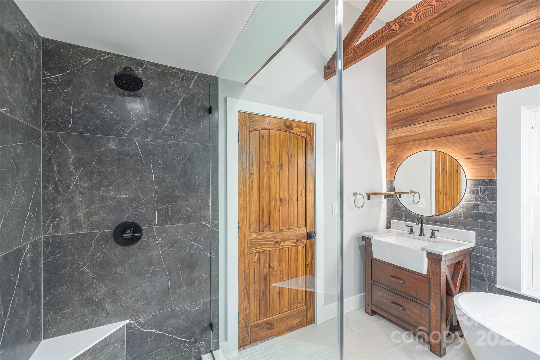 234 Erwin Hills Road Asheville, NC 28806 - Photo 26 of 47 a bathroom with a sink a toilet and shower