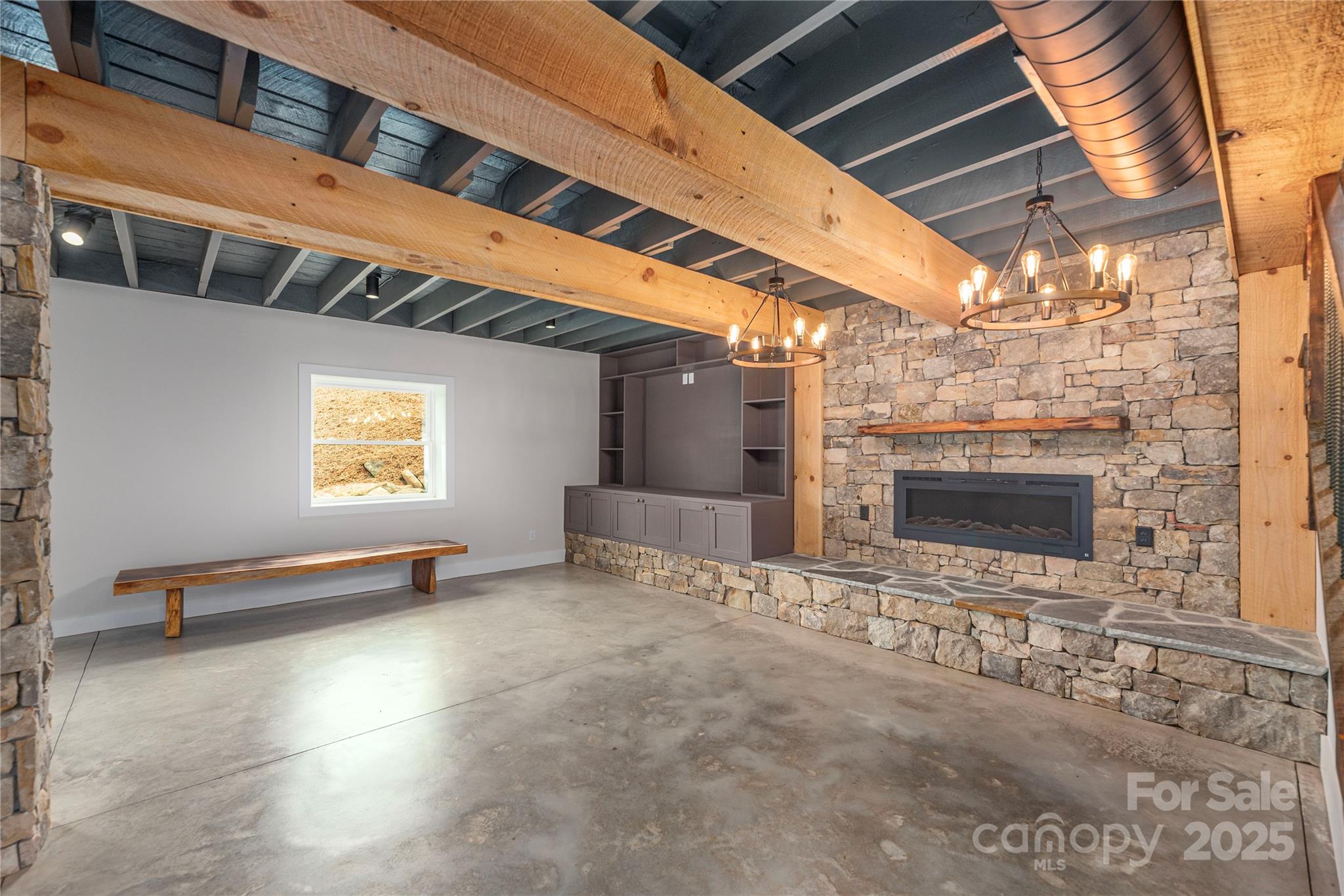234 Erwin Hills Road Asheville, NC 28806 - Photo 28 of 47 a view of an empty room with a fireplace