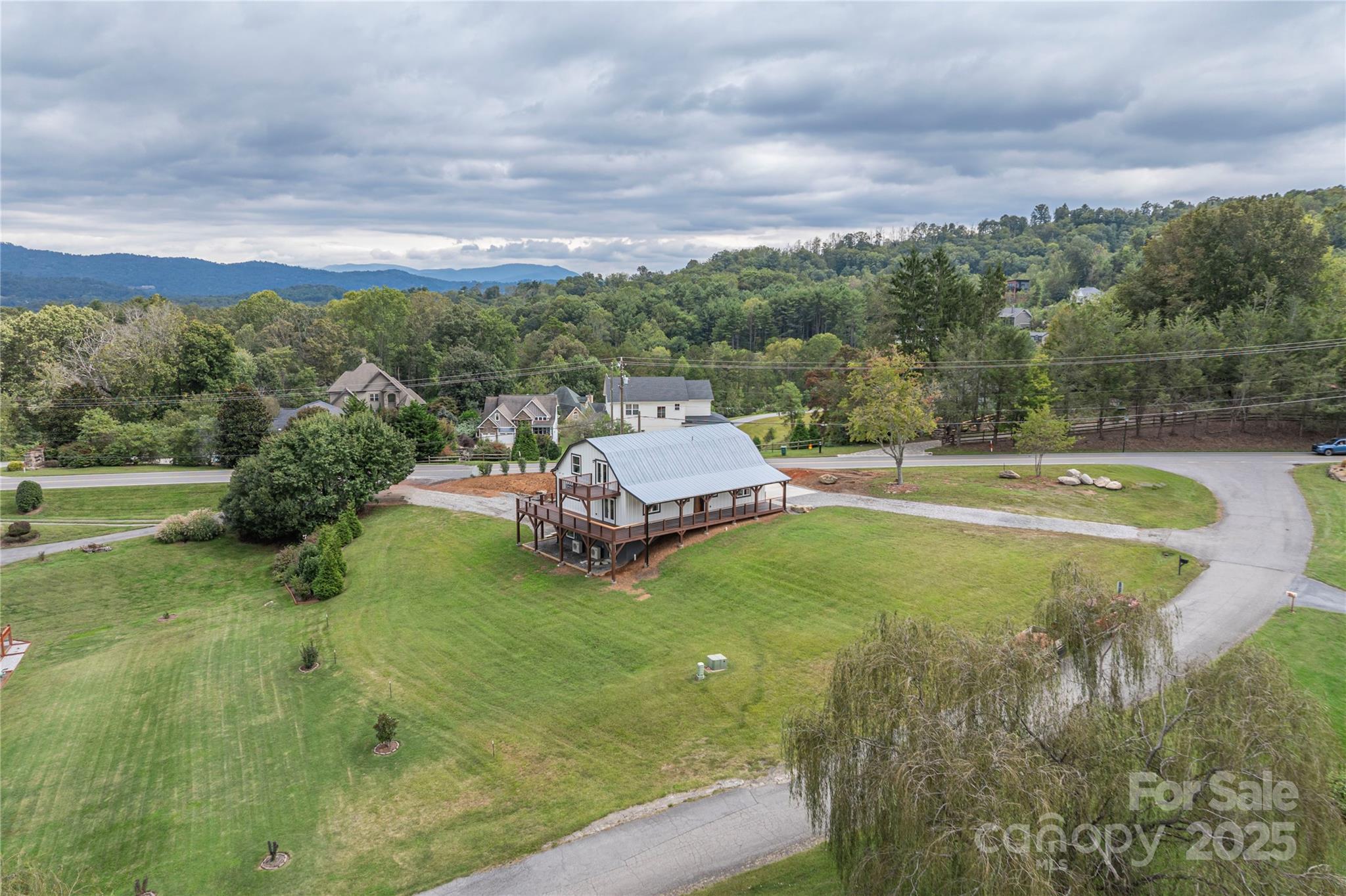 234 Erwin Hills Road Asheville, NC 28806 - Photo 3 of 47 a view of a swimming pool with a yard
