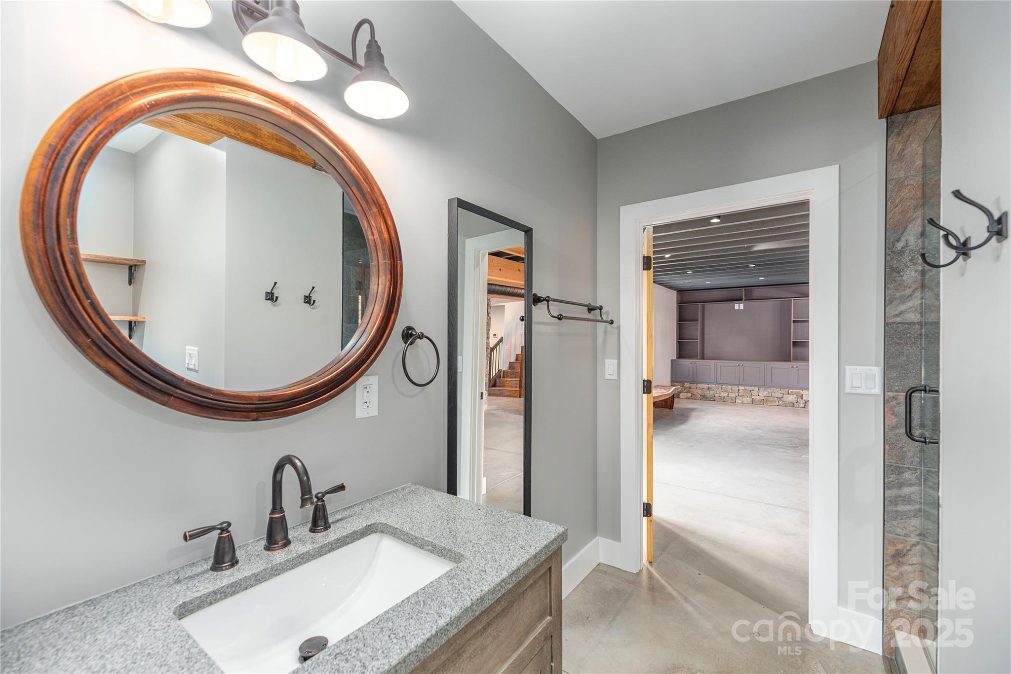 234 Erwin Hills Road Asheville, NC 28806 - Photo 39 of 47 a bathroom with a sink and a mirror