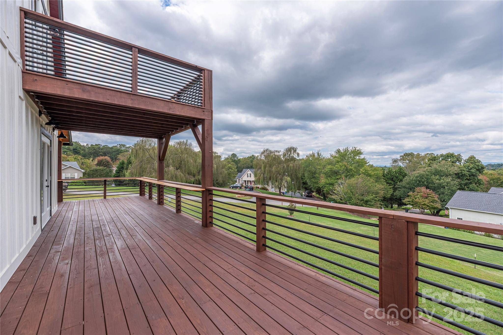 234 Erwin Hills Road Asheville, NC 28806 - Photo 40 of 47 a view of a balcony with wooden floor