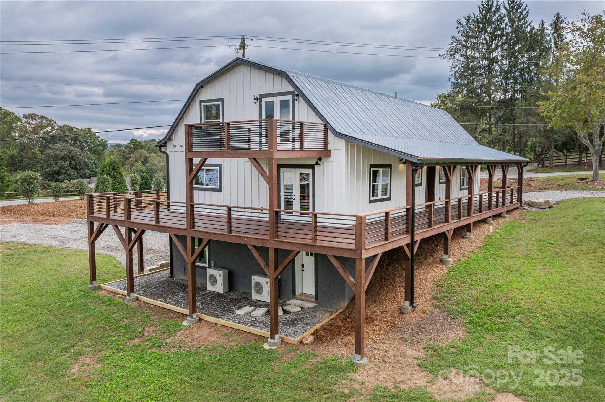 234 Erwin Hills Road Asheville, NC 28806 - Photo 5 of 47 a view of a house with a yard and deck