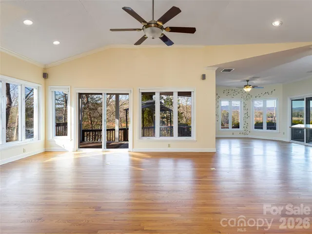 a kitchen with granite countertop a refrigerator and a sink