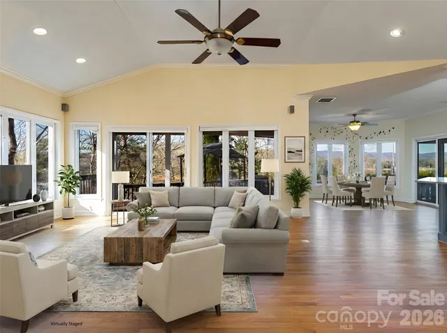 a view of an entryway and wooden floor