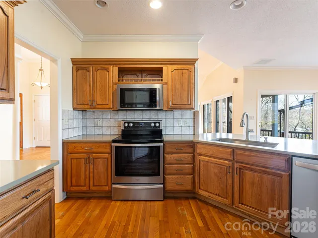 a spacious bathroom with a double vanity sink and mirror