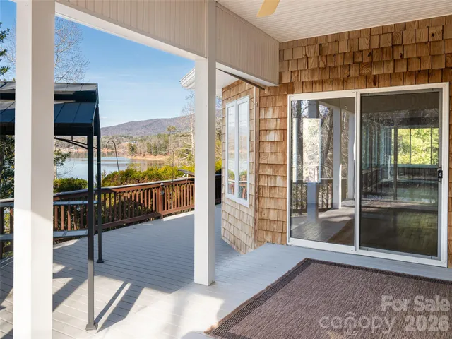 a bathroom with a shower sink and mirror