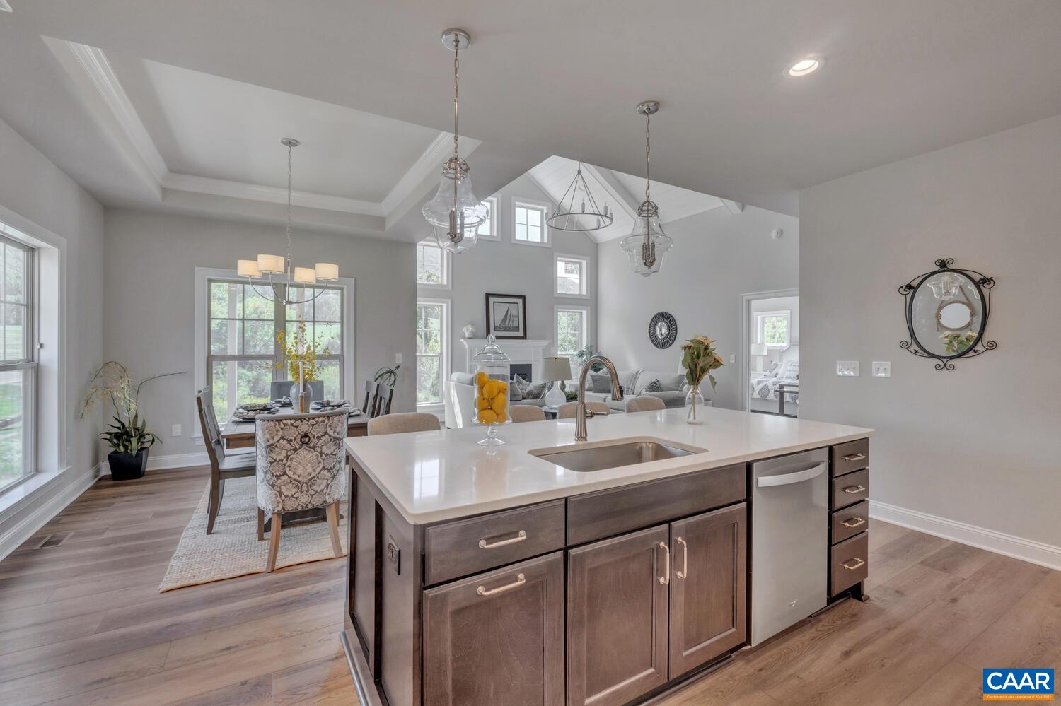 115 Riparian Court, Unit B Charlottesville, VA 22911 - Photo 17 of 58 a view of a dining room with furniture window and wooden floor
