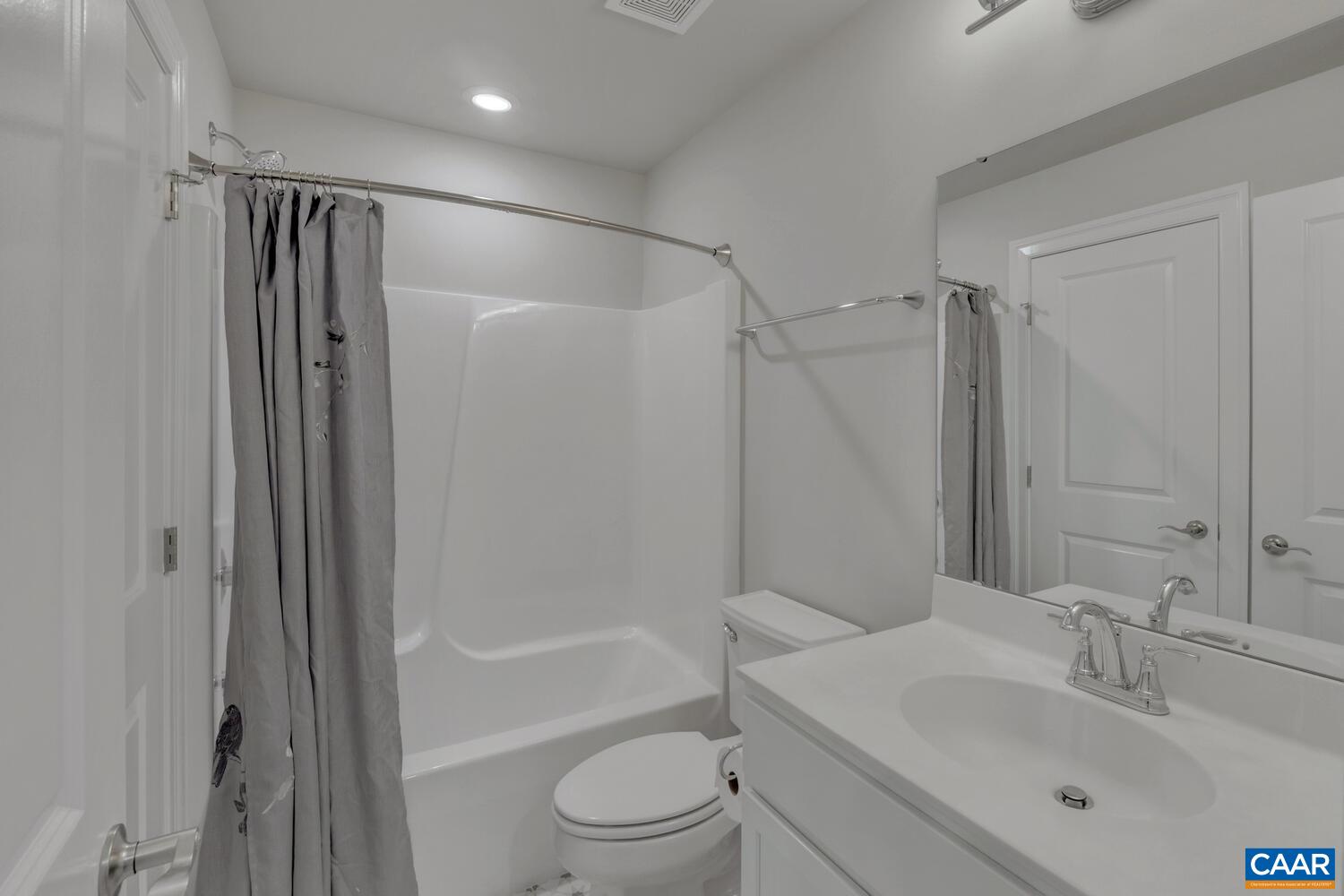 115 Riparian Court, Unit B Charlottesville, VA 22911 - Photo 36 of 58 a bathroom with a sink toilet and shower