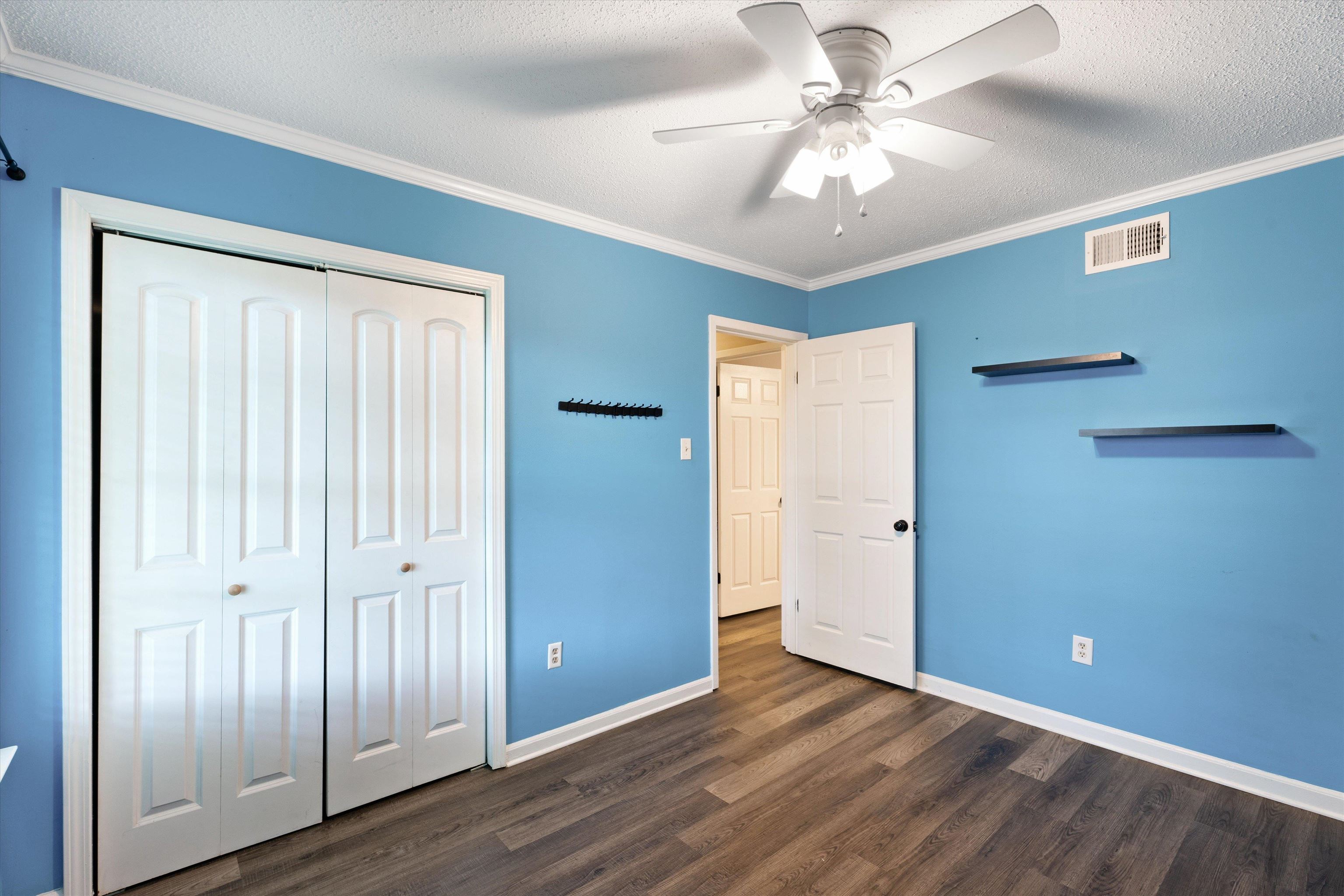 960 Greenview Road Collierville, TN 38017 - Photo 17 of 23 a view of an empty room with window chandelier fan