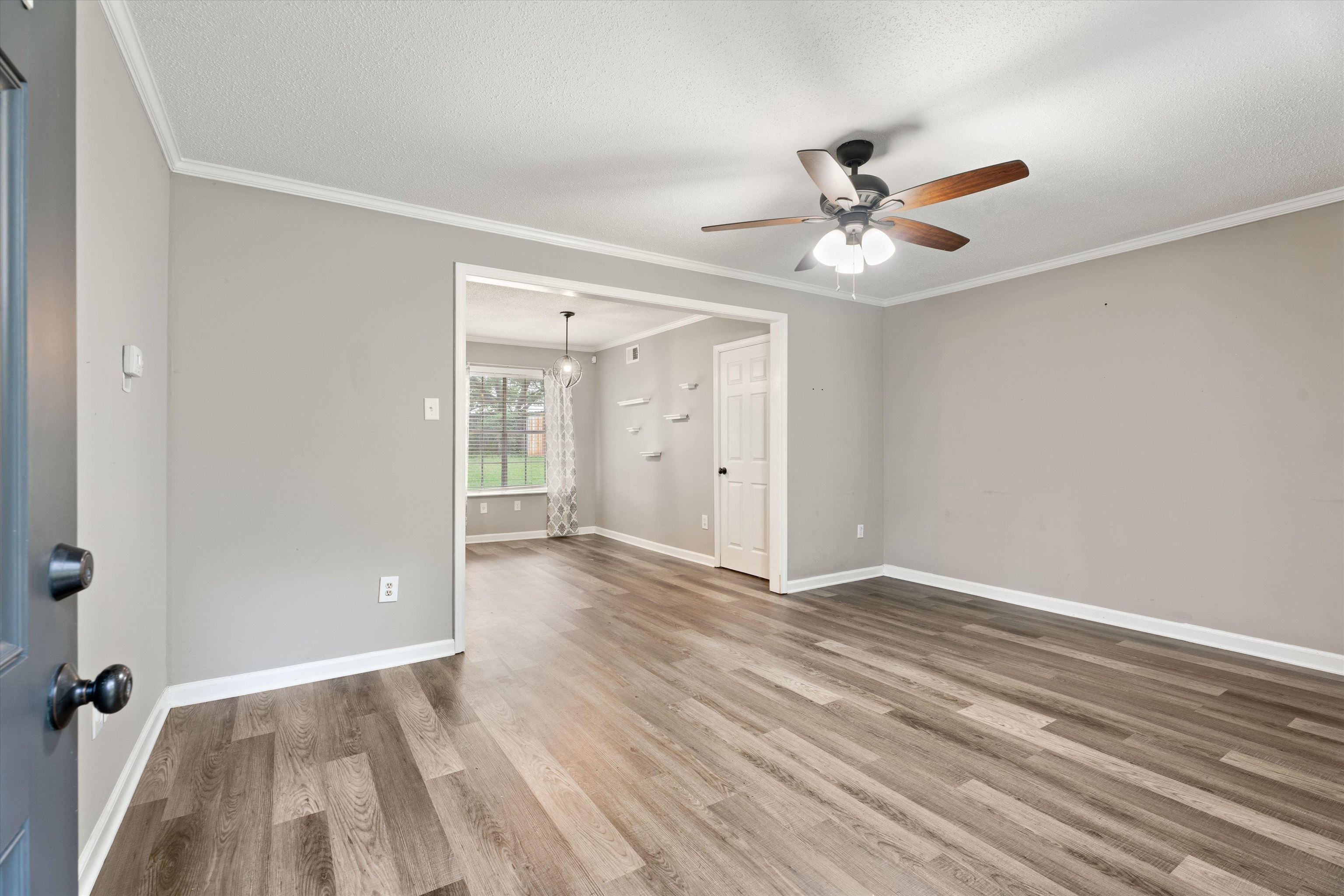 960 Greenview Road Collierville, TN 38017 - Photo 5 of 23 wooden floor in an empty room with a window