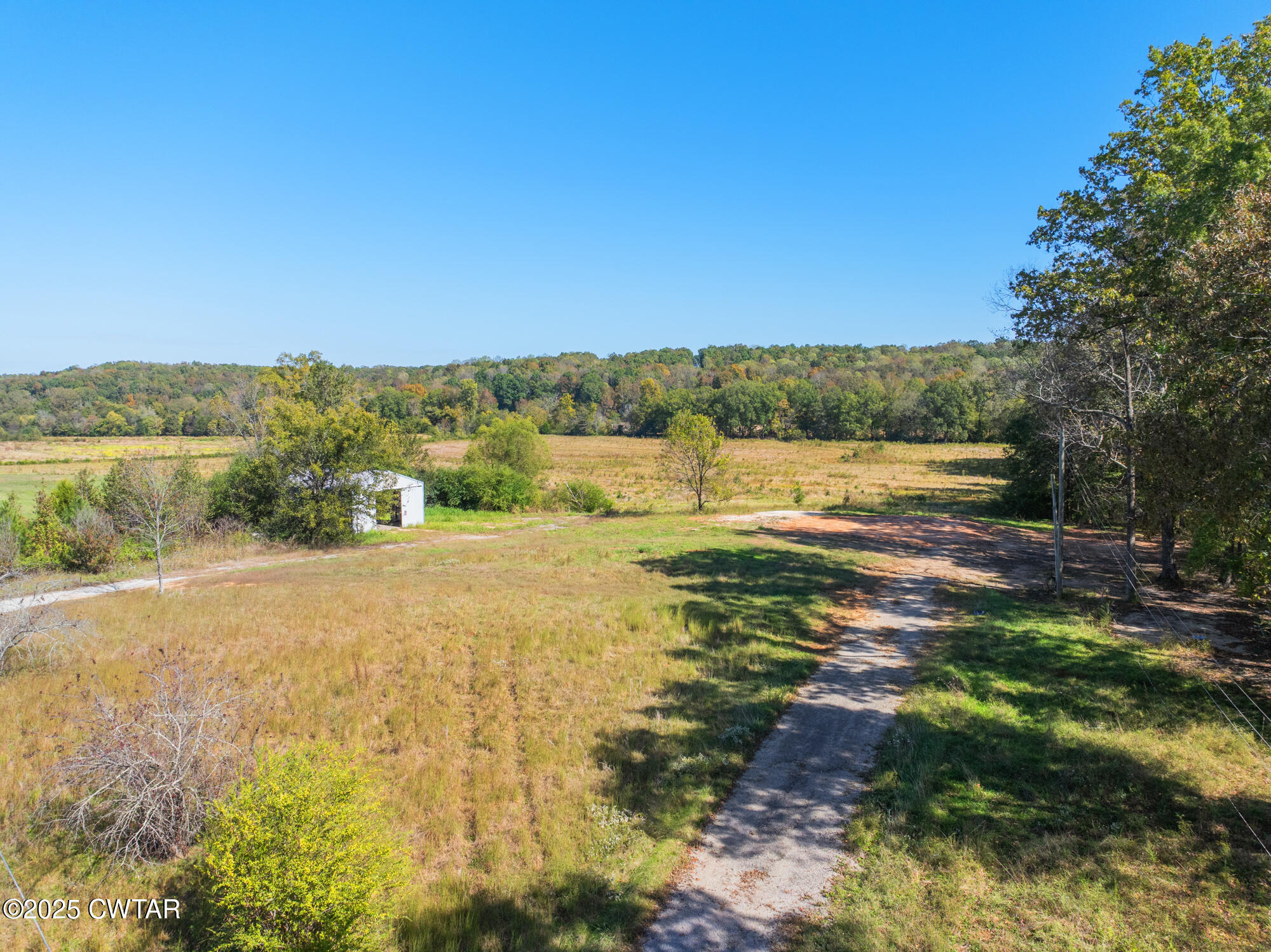 490 Maxwell Road Scotts Hill, TN 38374 - Photo 1 of 10 a view of an ocean beach
