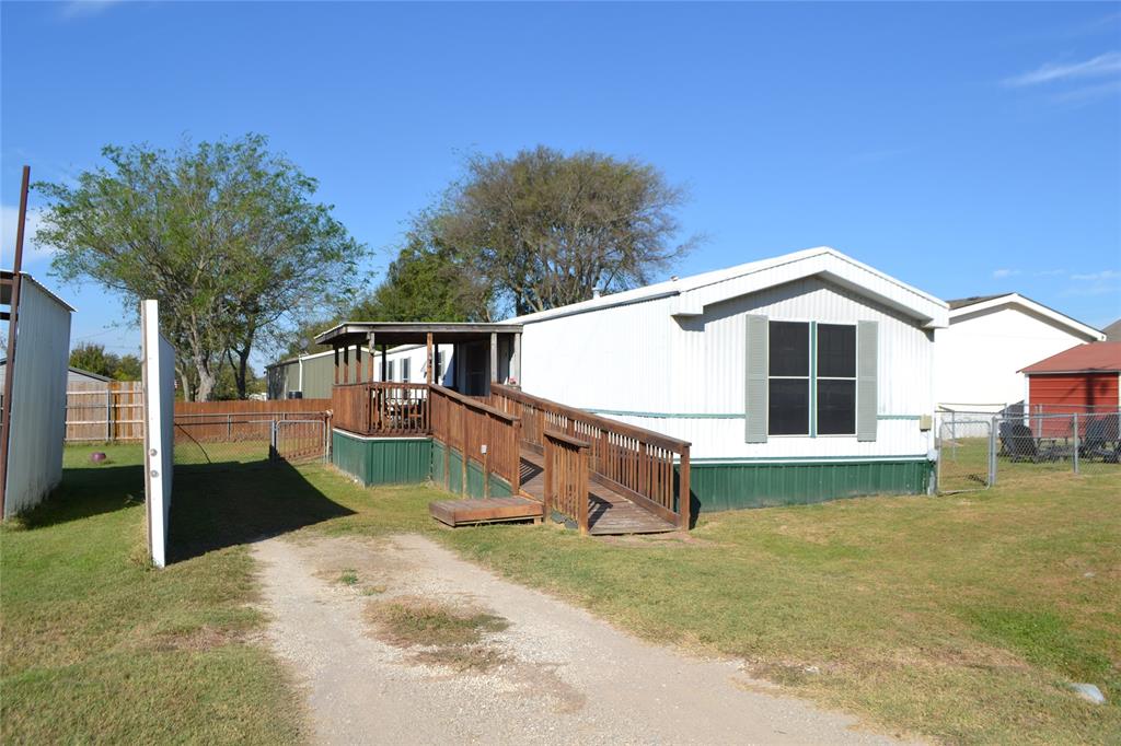 174 Kickapoo Quitman, TX 75783 - Photo 1 of 25 a view of a house with a yard
