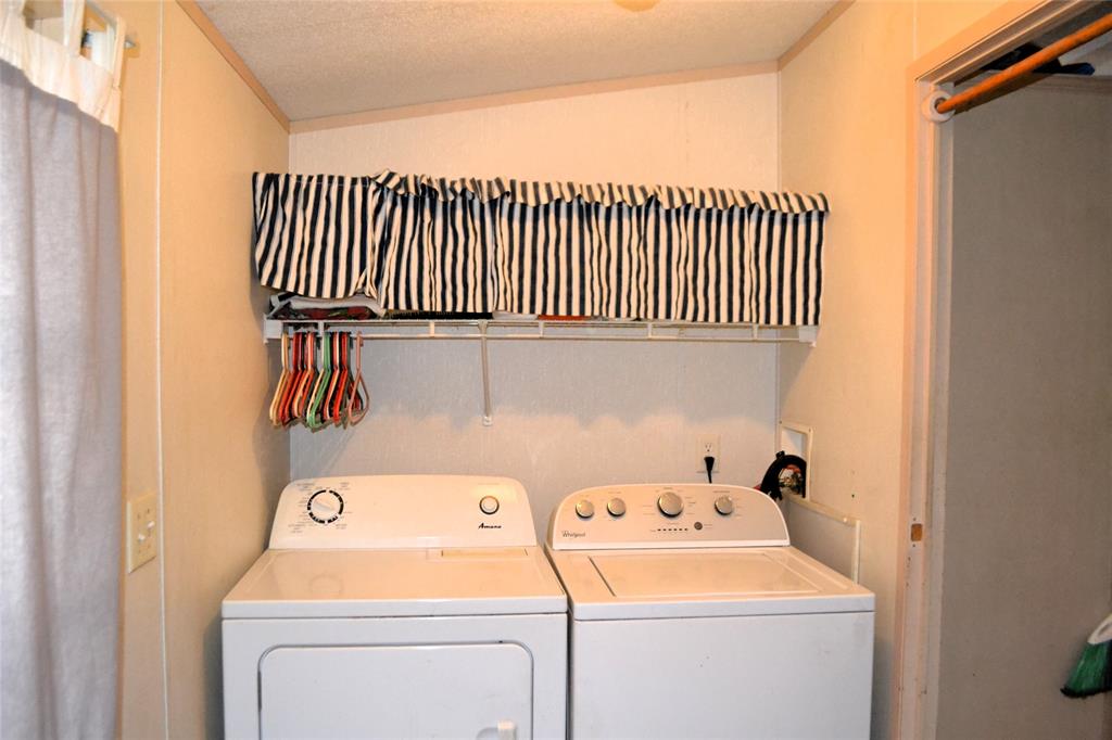 174 Kickapoo Quitman, TX 75783 - Photo 19 of 25 a utility room with dryer and washer