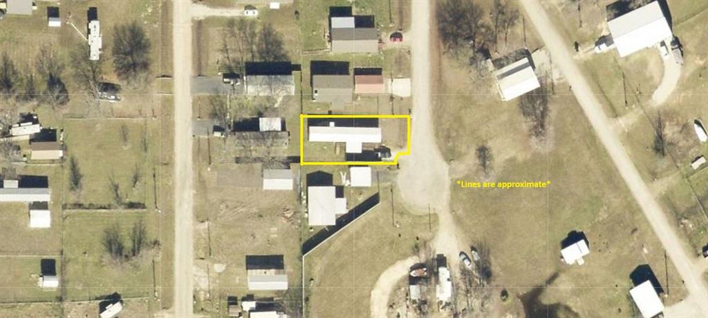 174 Kickapoo Quitman, TX 75783 - Photo 2 of 25 a bathroom with a shower