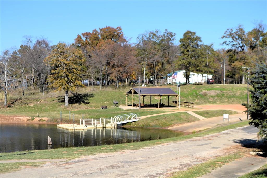 174 Kickapoo Quitman, TX 75783 - Photo 24 of 25 a view of a yard in front of the house