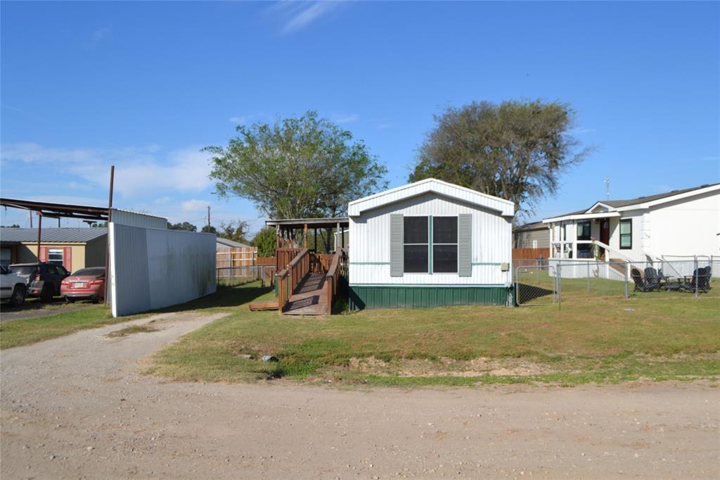 174 Kickapoo Quitman, TX 75783 - Photo 5 of 25 a view of a house with a yard