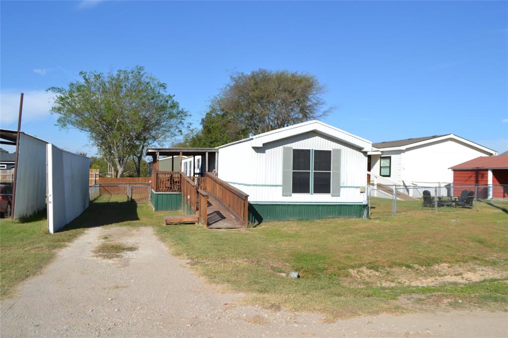 174 Kickapoo Quitman, TX 75783 - Photo 6 of 25 a view of a house with a yard