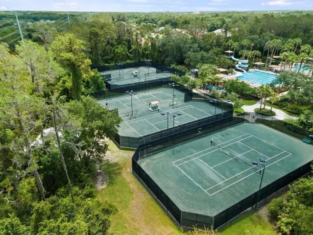 a view of a pool with a yard