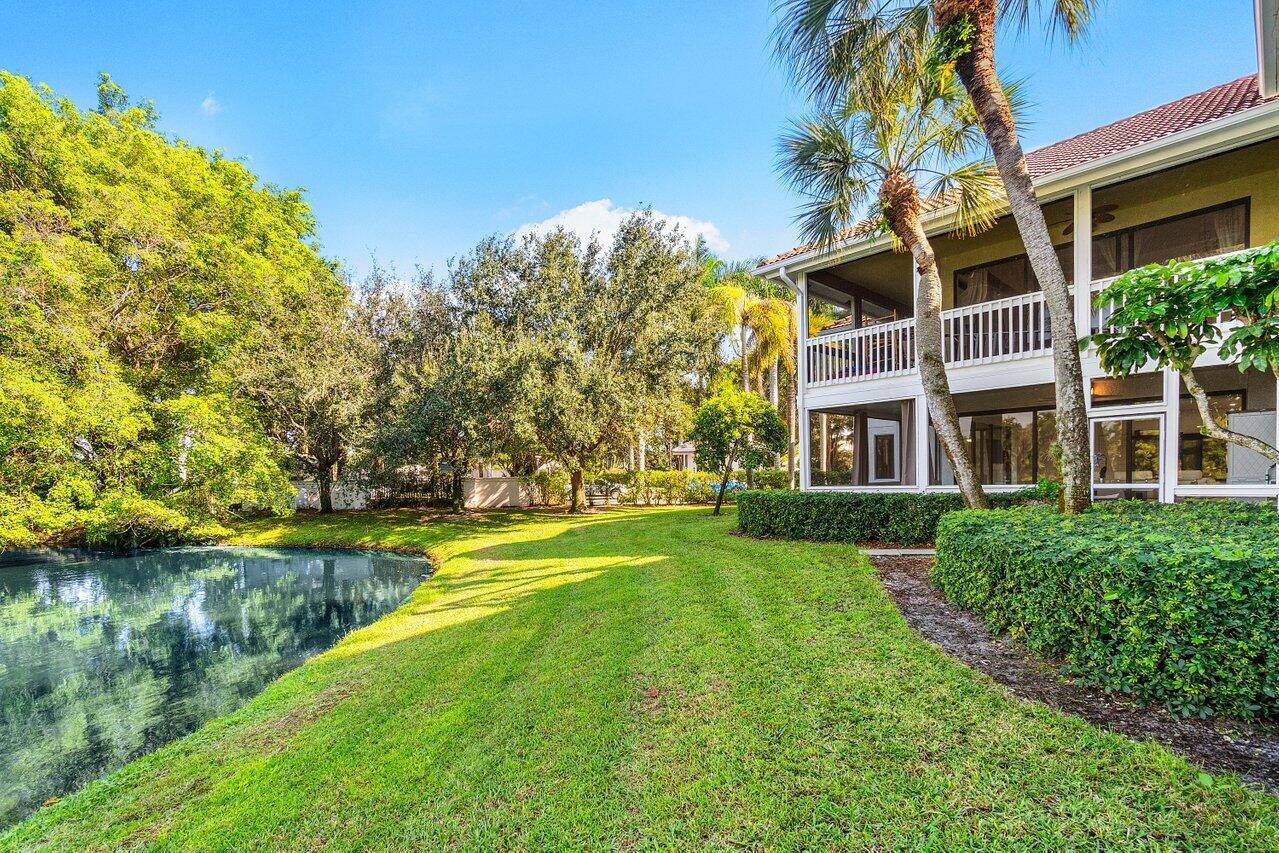 19173 Sabal Lake Drive, Unit 5155 Boca Raton, FL 33434 - Photo 33 of 33 a view of a building with a yard