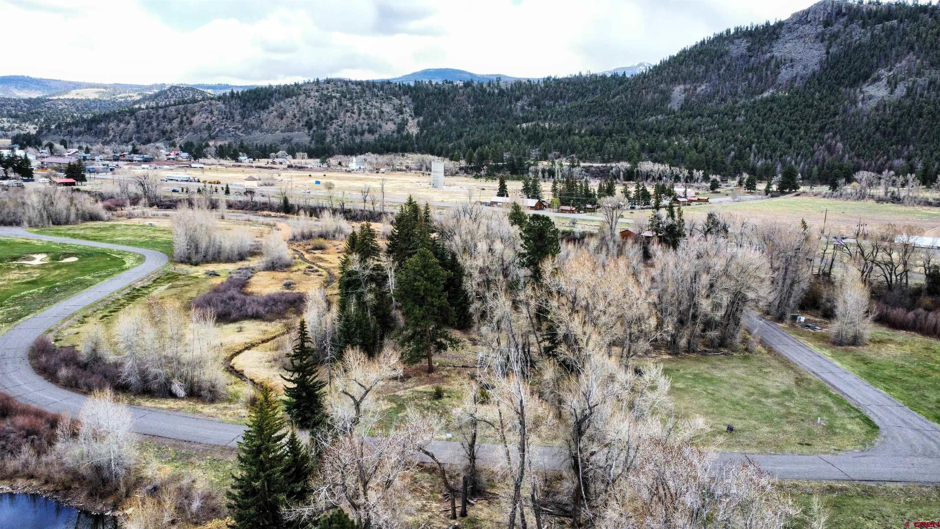 20 East Riverside Court South Fork, CO 81154 - Photo 7 of 20 a view of a town with mountains in the background
