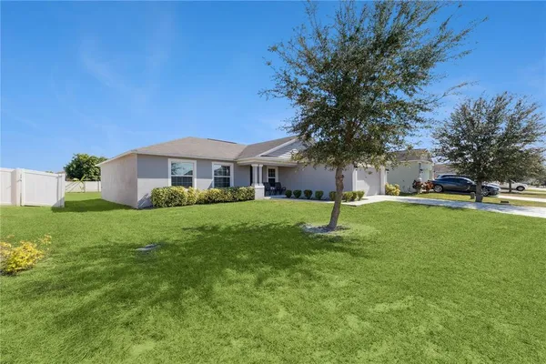 a house with garden in front of it