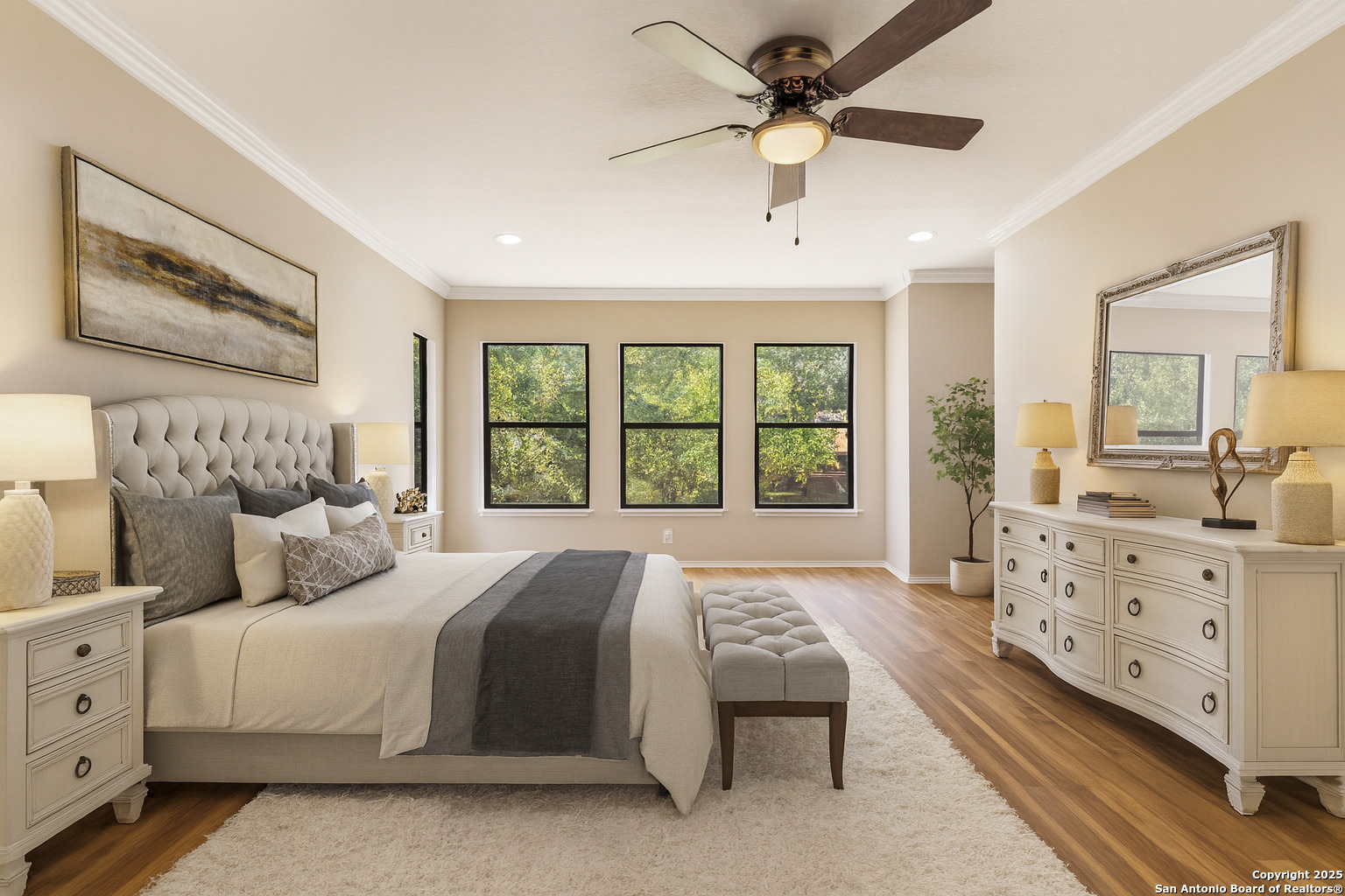 8127 Talkenhorn Converse, TX 78109 - Photo 16 of 57 a bedroom with a large bed and a dresser