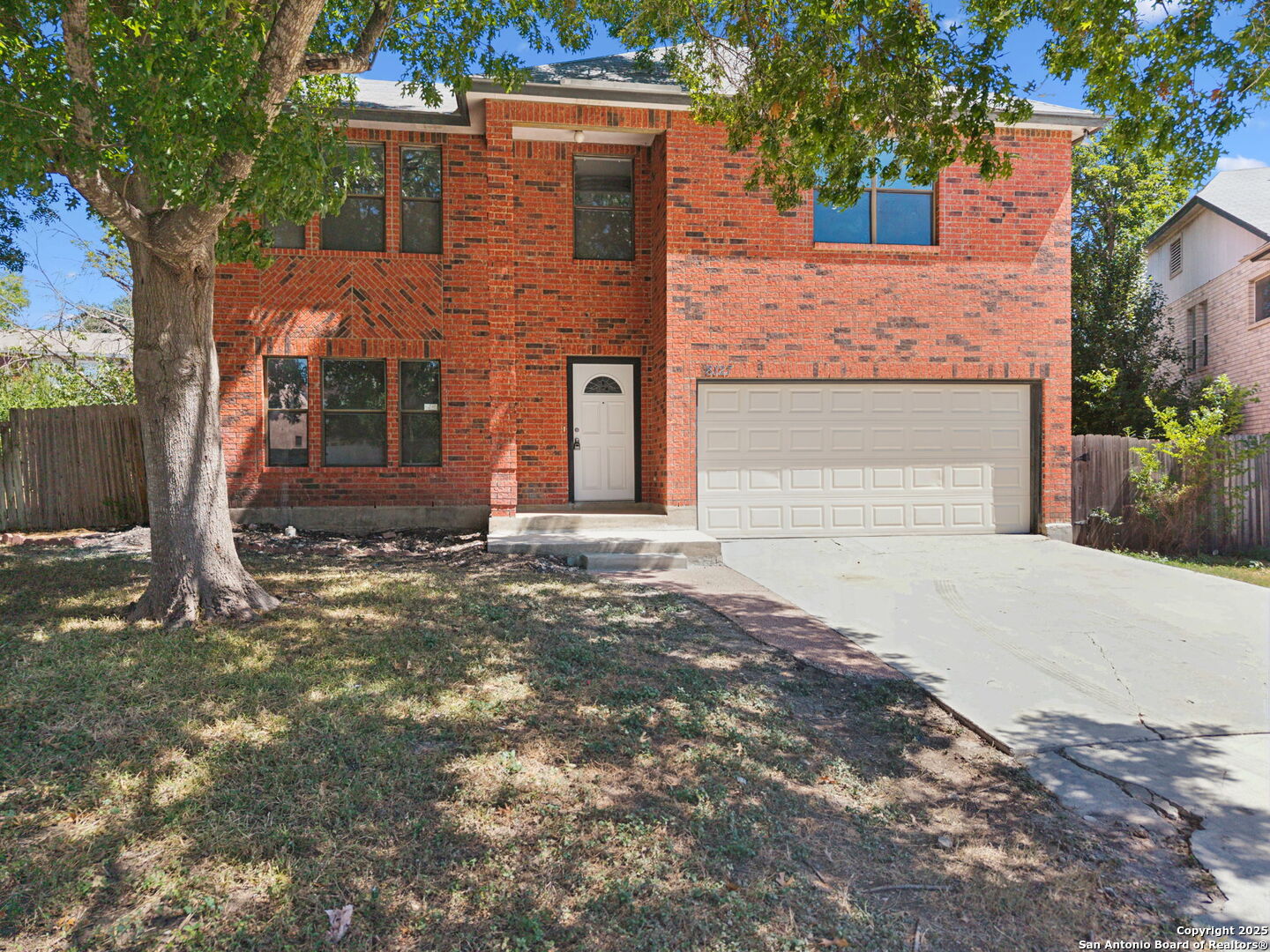 8127 Talkenhorn Converse, TX 78109 - Photo 21 of 57 front view of a house with a yard