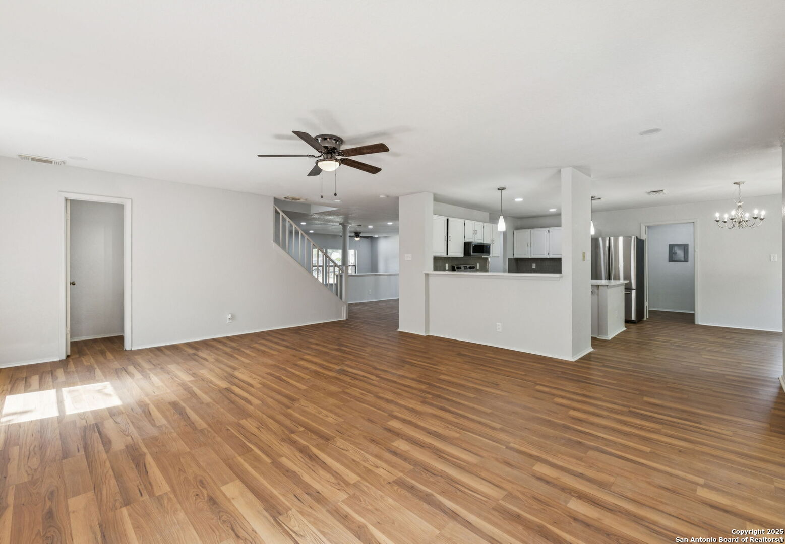 8127 Talkenhorn Converse, TX 78109 - Photo 28 of 57 a view of a kitchen with a dishwasher cabinets and wooden floor